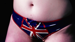 HarmonyVision-Video: Tied up kinky redhead wearing latex